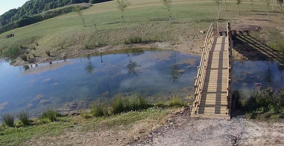 The footbridge at Holm Lake