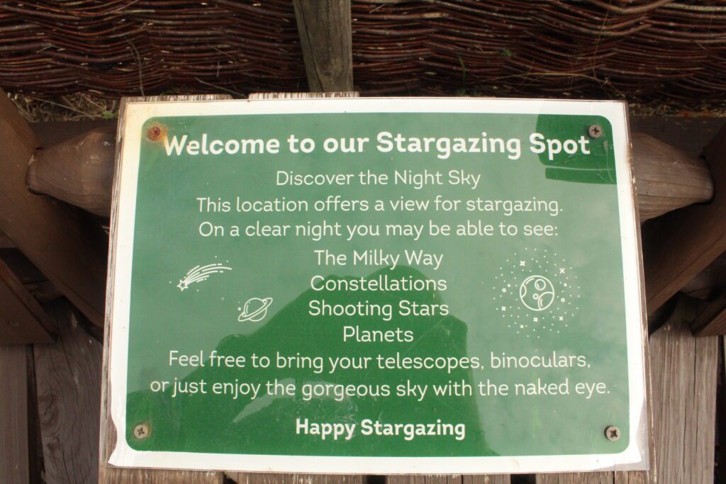 The Welcome to our Stargazing Spot sign at Rockingham Forest Park, listing the Milky Way, constellations, shooting stars and planets as things to look for on a clear night